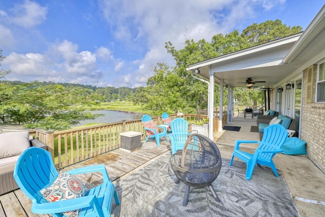150 Edgewater Way, Point Blank, TX 77364 - wooden deck with an outdoor fire pit and ceiling fan