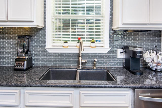 150 Edgewater Way, Point Blank, TX 77364 - kitchen featuring dishwasher, tasteful backsplash, and white cabinets