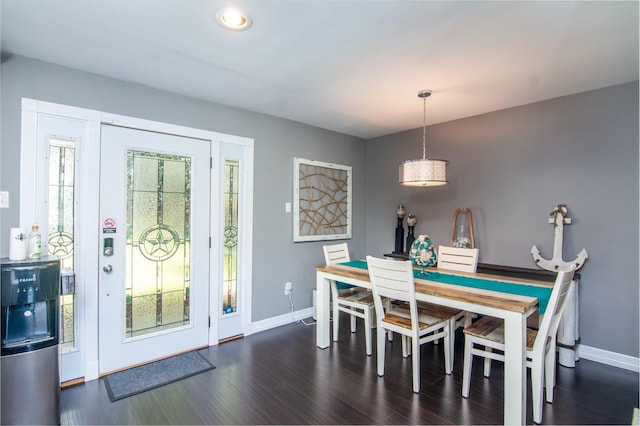 150 Edgewater Way, Point Blank, TX 77364 - dining room featuring baseboards and dark wood-style flooring