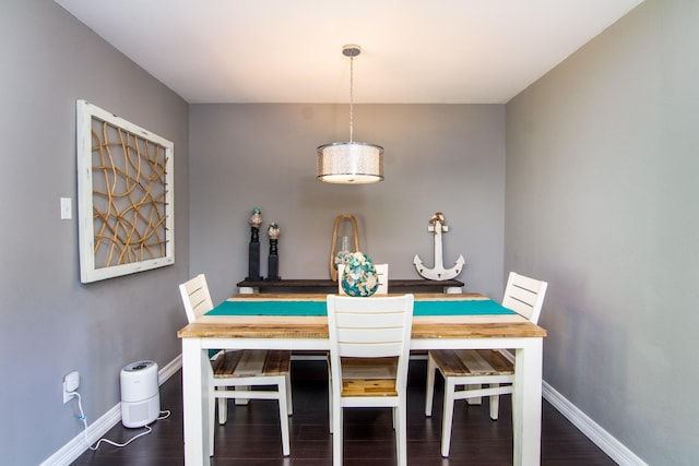 150 Edgewater Way, Point Blank, TX 77364 - dining area featuring baseboards and wood finished floors