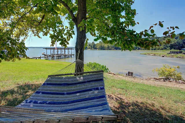 150 Edgewater Way, Point Blank, TX 77364 - dock featuring a water view and a yard