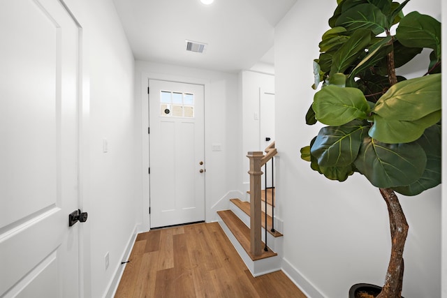835E Elkhart St, Houston, TX 77091 - entryway featuring wood finished floors and stairway