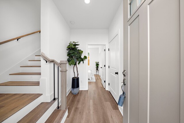 835E Elkhart St, Houston, TX 77091 - entrance foyer with light wood-style floors, stairs, and recessed lighting