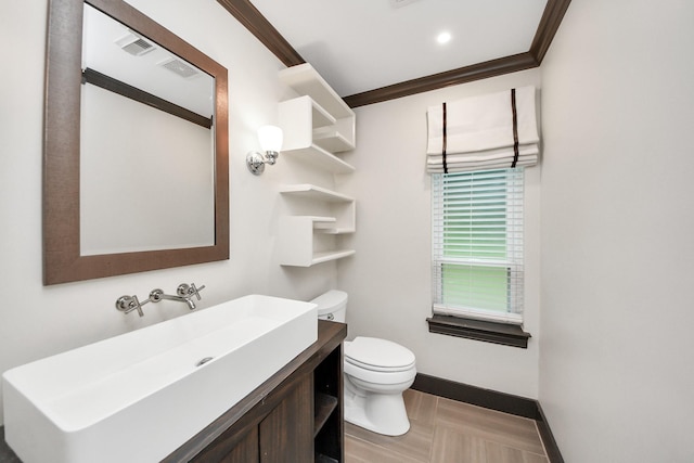 606 Montclair Blvd, Sugar Land, TX 77478 - half bath with vanity and crown molding