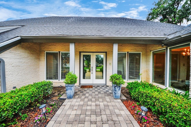 606 Montclair Blvd, Sugar Land, TX 77478 - doorway to property with roof with shingles and french doors