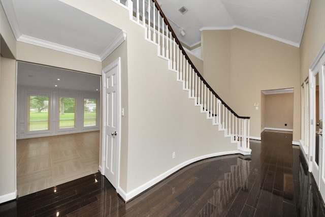606 Montclair Blvd, Sugar Land, TX 77478 - entrance foyer with wood finished floors, stairway, crown molding, and lofted ceiling