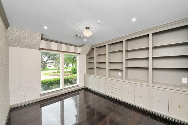 606 Montclair Blvd, Sugar Land, TX 77478 - unfurnished dining area with recessed lighting and wallpapered walls