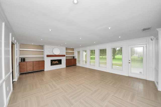 606 Montclair Blvd, Sugar Land, TX 77478 - unfurnished living room with a fireplace and recessed lighting