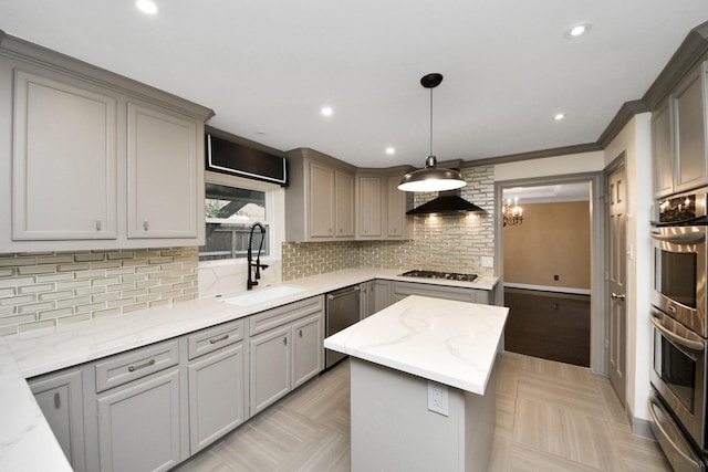 606 Montclair Blvd, Sugar Land, TX 77478 - kitchen featuring gray cabinetry, stainless steel appliances, a warming drawer, decorative backsplash, and light stone countertops