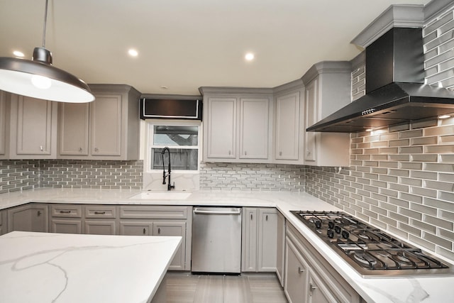 606 Montclair Blvd, Sugar Land, TX 77478 - kitchen with wall chimney exhaust hood, stainless steel appliances, gray cabinets, tasteful backsplash, and recessed lighting