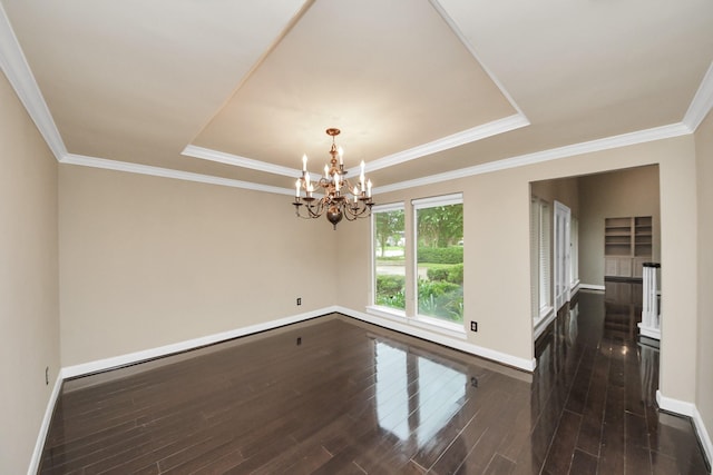 606 Montclair Blvd, Sugar Land, TX 77478 - spare room with a raised ceiling, dark wood-style floors, a chandelier, and ornamental molding