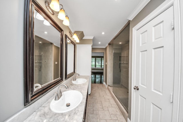 606 Montclair Blvd, Sugar Land, TX 77478 - full bathroom featuring crown molding, stone tile flooring, double vanity, and recessed lighting