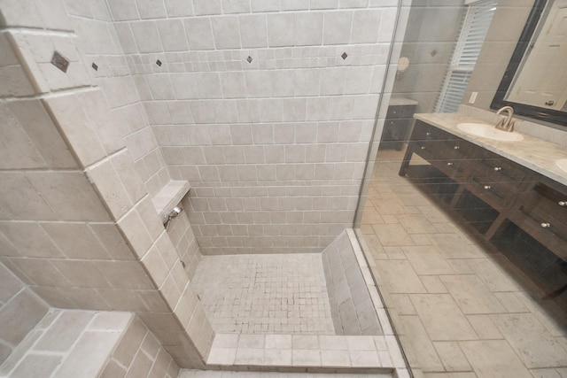 606 Montclair Blvd, Sugar Land, TX 77478 - bathroom featuring tiled shower and vanity