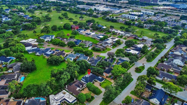 606 Montclair Blvd, Sugar Land, TX 77478 - aerial overview of property's location featuring a local golf course and nearby suburban area