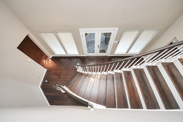 606 Montclair Blvd, Sugar Land, TX 77478 - stairway featuring french doors and hardwood / wood-style flooring
