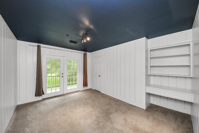 606 Montclair Blvd, Sugar Land, TX 77478 - empty room with carpet flooring and french doors