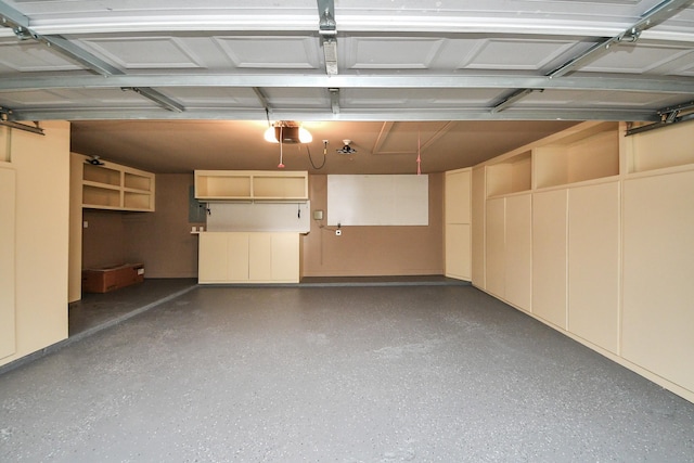 606 Montclair Blvd, Sugar Land, TX 77478 - garage featuring electric panel and a garage door opener