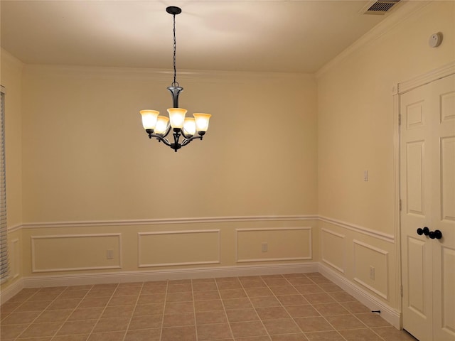 17427 Marigold Dr, Sugar Land, TX 77479 - spare room featuring a chandelier, ornamental molding, a smoke detector, a decorative wall, and wainscoting