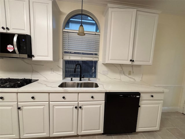 17427 Marigold Dr, Sugar Land, TX 77479 - kitchen featuring black appliances, white cabinetry, light stone countertops, and light tile patterned floors