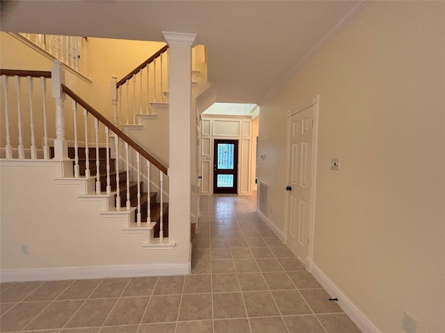 17427 Marigold Dr, Sugar Land, TX 77479 - stairway with tile patterned flooring and ornamental molding