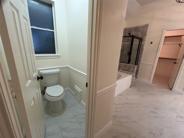17427 Marigold Dr, Sugar Land, TX 77479 - full bathroom with marble look tile flooring, a shower stall, a garden tub, and a spacious closet