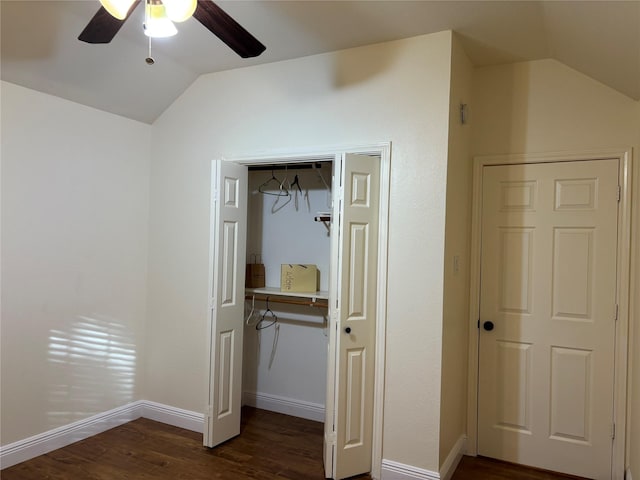 17427 Marigold Dr, Sugar Land, TX 77479 - unfurnished bedroom with vaulted ceiling, dark wood-style flooring, a closet, and a ceiling fan