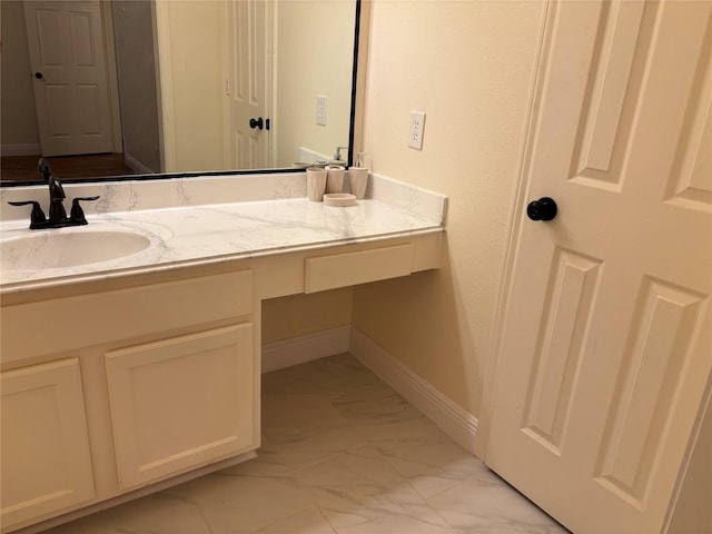 17427 Marigold Dr, Sugar Land, TX 77479 - bathroom featuring marble finish flooring and vanity