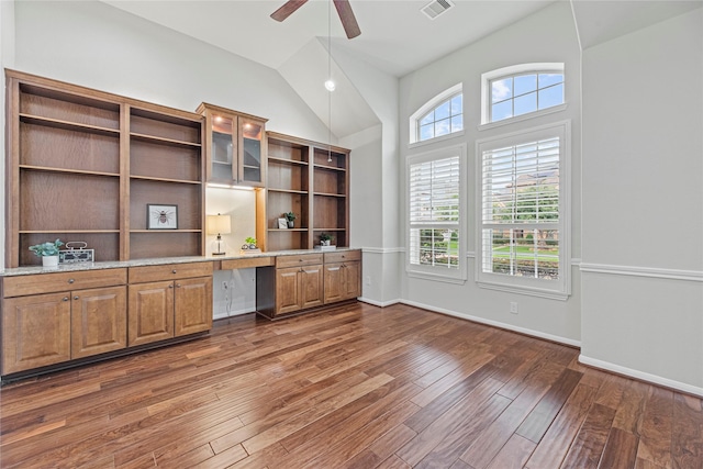 3102 Hillside Landing Trl, Katy, TX 77494 - unfurnished office with built in desk, wood finished floors, a ceiling fan, and high vaulted ceiling