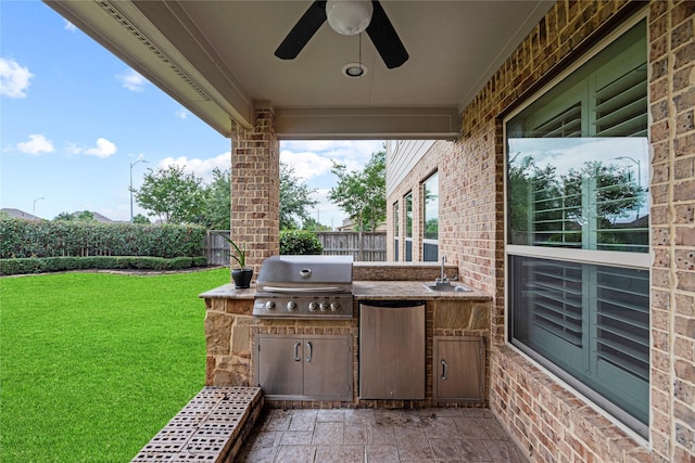 3102 Hillside Landing Trl, Katy, TX 77494 - fenced backyard featuring exterior kitchen and ceiling fan