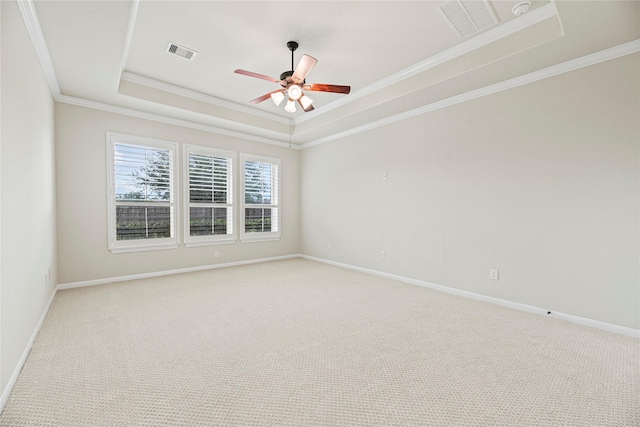 3102 Hillside Landing Trl, Katy, TX 77494 - unfurnished room featuring crown molding, a tray ceiling, light colored carpet, and ceiling fan