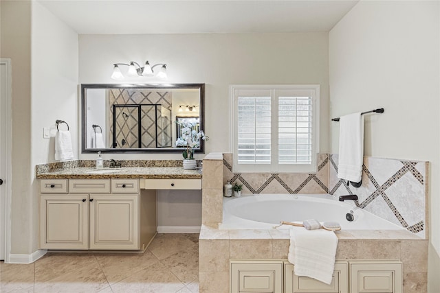 3102 Hillside Landing Trl, Katy, TX 77494 - bathroom featuring a garden tub, vanity, and tile patterned flooring