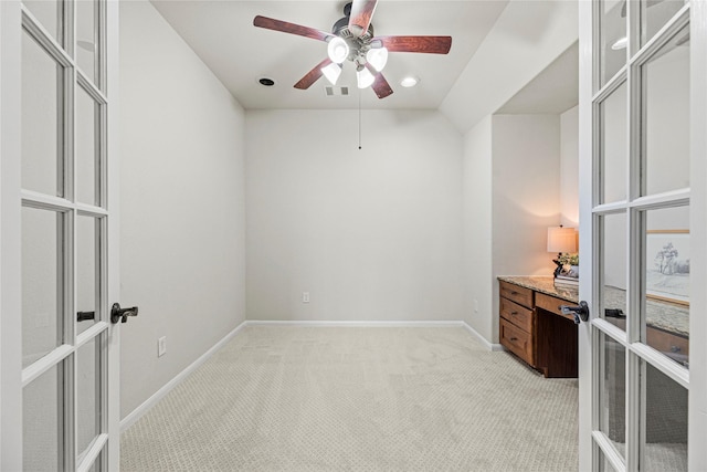 3102 Hillside Landing Trl, Katy, TX 77494 - unfurnished bedroom featuring french doors, light colored carpet, and ceiling fan
