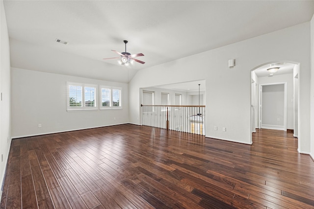 3102 Hillside Landing Trl, Katy, TX 77494 - spare room featuring a ceiling fan, wood-type flooring, arched walkways, and vaulted ceiling