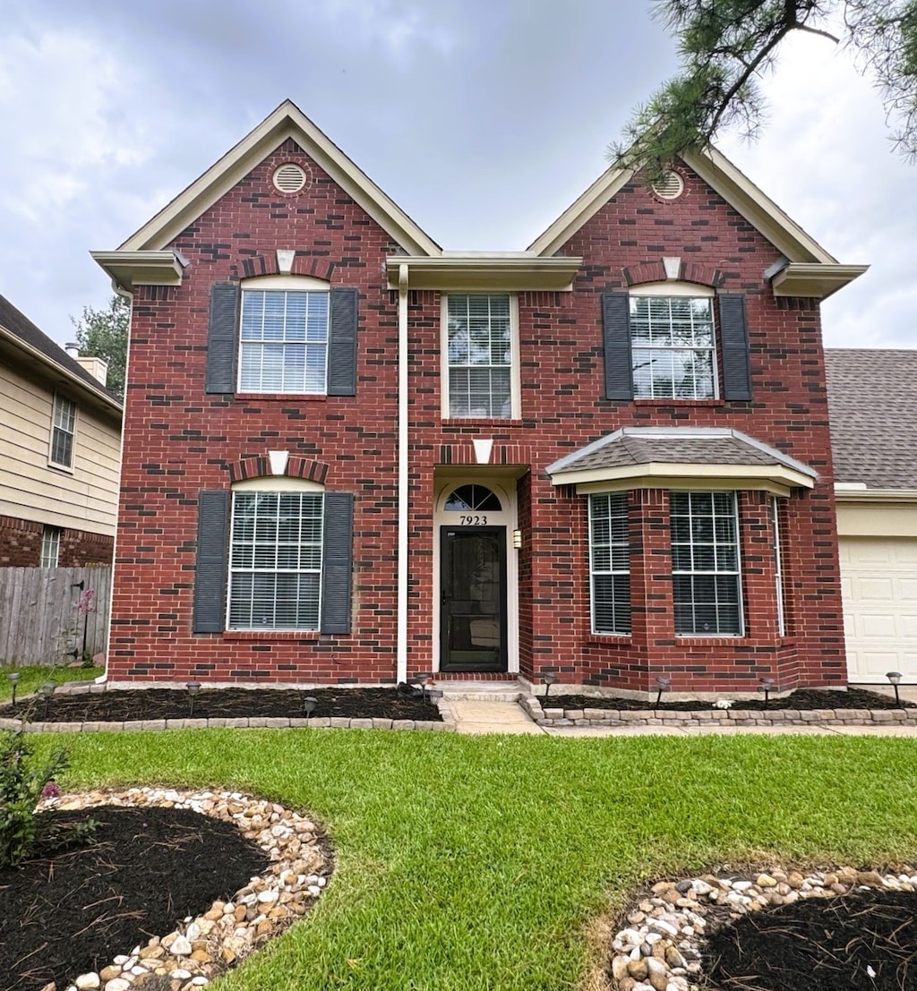 7923 Harvester St, Houston, TX 77095 - view of front of property with brick siding