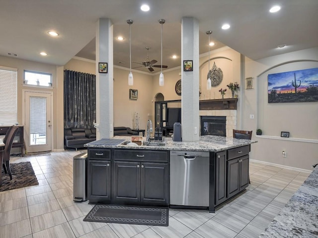 6127 Rosehill Harvest Loop, Katy, TX 77493 - kitchen featuring stainless steel dishwasher, open floor plan, ornamental molding, a ceiling fan, and light stone countertops