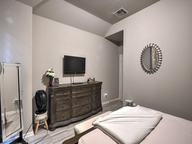 6127 Rosehill Harvest Loop, Katy, TX 77493 - bedroom featuring lofted ceiling and baseboards