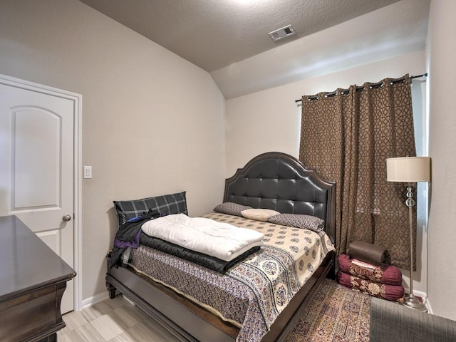 6127 Rosehill Harvest Loop, Katy, TX 77493 - bedroom featuring vaulted ceiling and baseboards