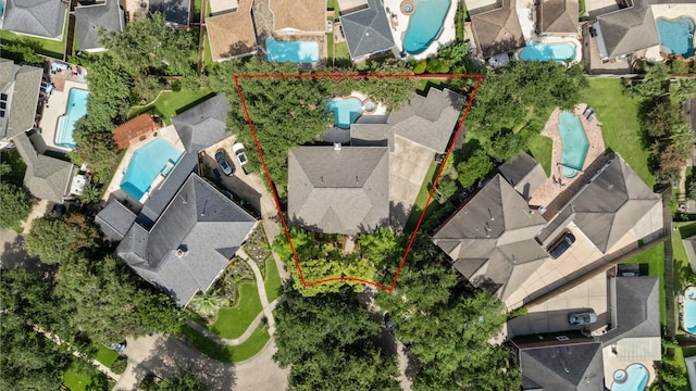 2413 Sawgrass Ct, League City, TX 77573 - aerial view of residential area featuring a pool area