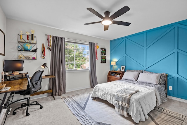 2413 Sawgrass Ct, League City, TX 77573 - bedroom with light colored carpet, a desk, a decorative wall, and ceiling fan