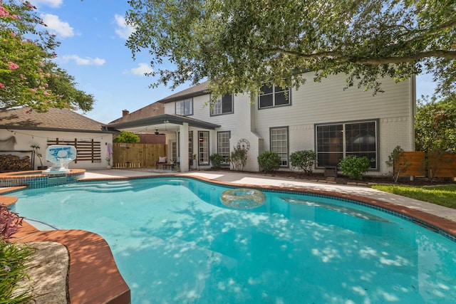 2413 Sawgrass Ct, League City, TX 77573 - view of swimming pool with a patio, ceiling fan, and a pool with connected hot tub