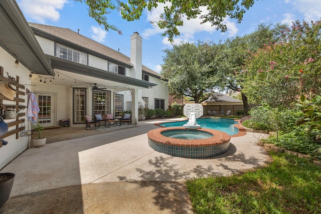 2413 Sawgrass Ct, League City, TX 77573 - view of pool with a patio area, ceiling fan, and a pool with connected hot tub