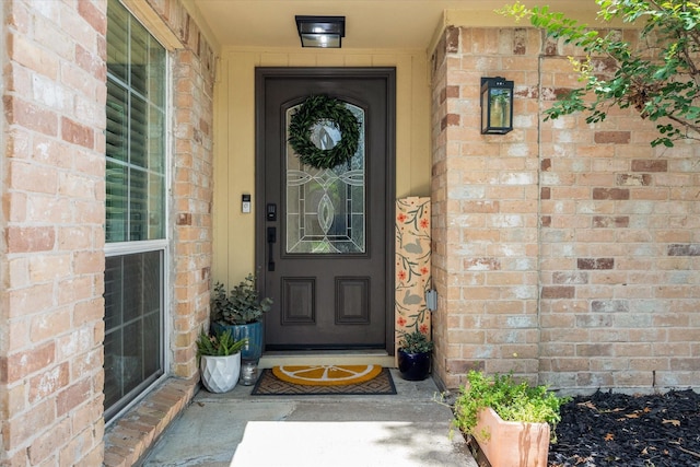 12502 Nova Dr, Houston, TX 77077 - view of exterior entry with brick siding and covered porch