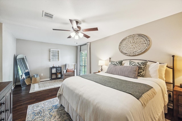 12502 Nova Dr, Houston, TX 77077 - bedroom featuring dark wood finished floors and ceiling fan