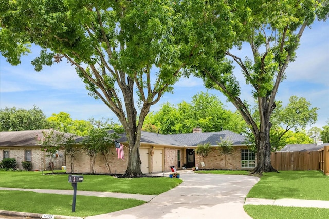 12502 Nova Dr, Houston, TX 77077 - ranch-style house with brick siding, an attached garage, concrete driveway, and a chimney
