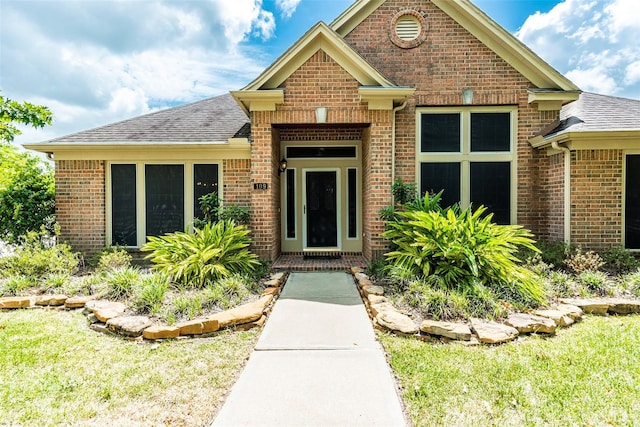 109 Smokey Lake Ln, Dickinson, TX 77539 - entrance to property with brick siding and a shingled roof