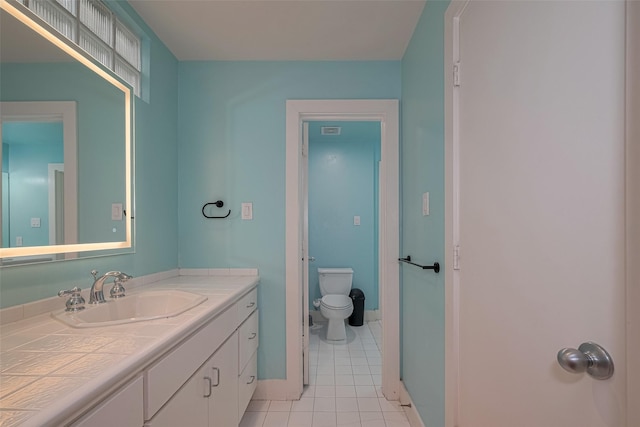308 Dennis St, Houston, TX 77006 - bathroom with vanity and tile patterned flooring