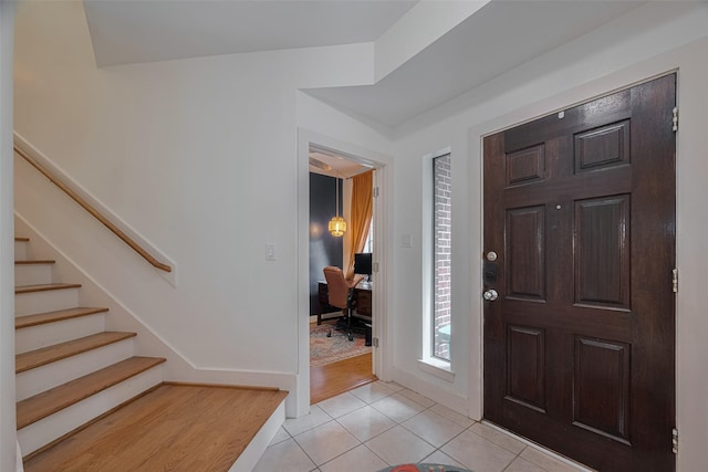 308 Dennis St, Houston, TX 77006 - entryway featuring light tile patterned floors and stairway