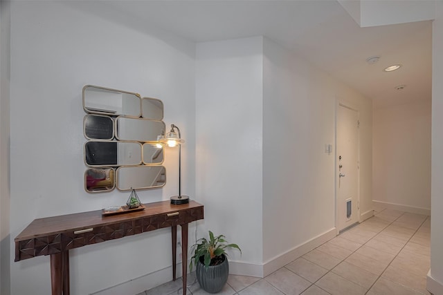 308 Dennis St, Houston, TX 77006 - hallway featuring light tile patterned floors and recessed lighting