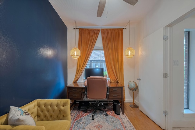 308 Dennis St, Houston, TX 77006 - office featuring wood finished floors and a ceiling fan