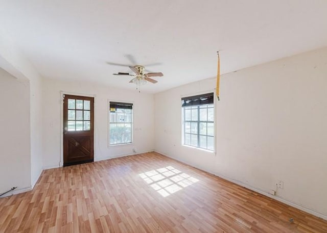 222 E Southland Ave, Alvin, TX 77511 - spare room featuring light wood-style flooring and ceiling fan